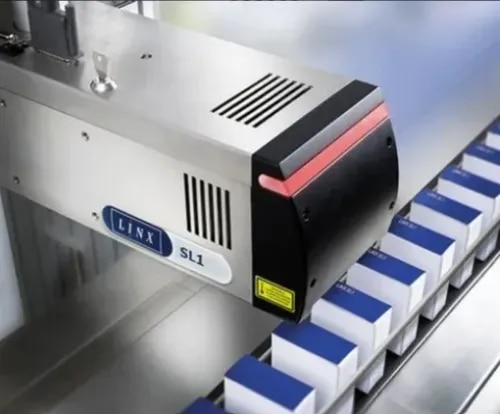 Product Details:Laser Type CO₂ LaserProduction Speed 120, 100 Piece/MinLaser Machine Type CO2 LaserLaser Power 20 WEtching Material PlasticMarking Area 110×110 mmModel Name/Number 7900Cooling Method Water CooledAutomation Grade Fully AutomaticCompatible Material Plastic, Paper, WoodPrint Speed 150 W per minObject Size ( L x W)MM 150 mm by 150 mmPower cable connection length 3 meterLaser Source Expected Life 1 lacs hourMarking Speed 6000 mm/sLaser Wavelength 355 nmPower Supply 110 V ACCountry of Origin Made in IndiaMachine Type OnlineLaser Coding System The SL1 is small, compact in size, and price too…but it is feature rich and powerful for it’s class. Classified as an entry level or economy coder, this lower cost laser will perform to many of our competitors standard 10 watt coder applications. With a stainless steel cover, Linx industrial accessories and the full featured Linx Draw software, this laser provides a complete system with savings and a competitive price.KEY FEATURES§ Fast flexible coding - without the cost§ Efficient, high power system design optimizes laser tube life, increasing reliability§ Low operational costs with no consumables§ Coding on a wide range of materials.