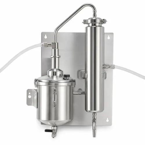 Stainless steel distilled water plant for producing pure distilled water in laboratories. Includes condenser assembly, kettle element and water inlet/outlet design depending on model. Suitable for chemistry labs, research labs, testing labs and general laboratory use.