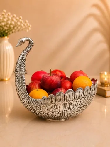Silver Duck Shaped Fruit Bowl: Elegant handcrafted silver fruit bowl featuring intricate Nakshi work, graceful duck design, detailed floral engravings, traditional artistry, and timeless craftsmanship.
