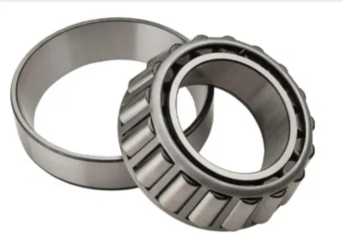 NTN Tapered Roller Bearings – Suresh Bearing CompanyNTN Tapered Roller Bearings Supplier in IndiaSuresh Bearing Company is a trusted supplier of NTN Tapered Roller Bearings, offering high-performance bearing solutions designed to handle combined radial and axial loads in demanding industrial, automotive, and heavy-duty applications.Manufactured with advanced engineering technology, premium bearing materials, and precise manufacturing processes, NTN Tapered Roller Bearings deliver excellent load capacity, durability, accuracy, and extended service life. These bearings are widely used where reliability, shock-load resistance, and long maintenance intervals are essential.Suresh Bearing Company provides a comprehensive range of NTN Tapered Roller Bearings, including single-row, double-row, four-row, metric, inch, and J-metric series to meet diverse industrial requirements.Advanced Case Carburization TechnologyNTN Tapered Roller Bearings feature an advanced case carburization process, which creates a hardened outer surface while maintaining a tough and durable inner core.This combination of surface hardness and core strength improves resistance against heavy shock loads, increases fatigue strength, and enhances overall bearing performance. The advanced treatment process can increase theoretical bearing life by up to 40%, helping reduce downtime and maintenance requirements.BenefitsSuperior shock-load resistanceIncreased bearing service lifeEnhanced fatigue strengthReduced maintenance frequencyImproved reliability under heavy loadsBetter performance in harsh operating conditionsSpecial Crowned Roller DesignNTN’s specially designed crowned rollers provide uniform load distribution across the complete roller contact surface. This design minimizes stress concentration at roller ends and improves bearing performance under demanding conditions.The crowned roller design also compensates for minor shaft misalignment and housing deflection, resulting in smoother operation and extended bearing life.FeaturesEven load distributionReduced edge stressImproved misalignment toleranceLower vibration and noise levelsEnhanced durabilityLonger operational lifeComprehensive NTN Tapered Roller Bearing RangeSuresh Bearing Company supplies a complete range of NTN Tapered Roller Bearings, including:Single Row Tapered Roller BearingsDouble Row Tapered Roller BearingsFour Row Tapered Roller BearingsISO Metric Series BearingsInch Series BearingsJ-Metric Series BearingsCone & Cup AssembliesBack-to-Back ArrangementsFace-to-Face ArrangementsDouble Cup DesignsDouble Cone DesignsPremium Materials & Manufacturing QualityNTN Tapered Roller Bearings are manufactured using high-quality bearing-grade alloy steel with precise heat treatment, dimensional control, and advanced surface finishing technology.These manufacturing processes ensure excellent wear resistance, high load capacity, and reliable performance even in challenging industrial environments.Key FeaturesHigh radial and axial load capacityPrecision-machined racewaysPremium alloy steel constructionExcellent wear resistanceHigh-speed capabilityLong operating lifeLow maintenance requirementsSuperior dimensional accuracyReliable performance under heavy loadsApplications of NTN Tapered Roller BearingsNTN Tapered Roller Bearings are widely used in:Automotive Wheel HubsGearboxesDifferential SystemsHeavy Industrial MachineryMining EquipmentConstruction MachinerySteel PlantsCement IndustryAgricultural EquipmentMaterial Handling SystemsRolling MillsRailway EquipmentIndustrial PumpsHeavy Engineering ApplicationsWhy Choose Suresh Bearing Company?Supplier of genuine NTN Tapered Roller BearingsComplete range of metric and inch seriesCompetitive market pricingExpert technical guidanceReady stock availabilityReliable supply across IndiaQuality-assured industrial bearing solutionsStrong customer support and after-sales serviceIndustries We ServeOur NTN bearing solutions are used across:Automotive IndustryManufacturing IndustryMining IndustrySteel & Metal ProcessingCement PlantsPower GenerationConstruction IndustryAgriculture IndustryMaterial Handling IndustryRailway IndustryPaper IndustryHeavy Engineering Industry