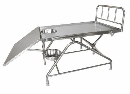 The Labour Table (Foot End Folding) is designed for obstetric examinations, labour, delivery, and gynecological procedures. It features a sturdy stainless steel frame with a folding foot-end section, ensuring easy patient positioning and improved accessibility during delivery. The table is equipped with removable stainless steel bowls and is built for durability, hygiene, and reliable performance in hospitals and maternity wards.SpecificationOverall Size: 1830 mm (L) × 710 mm (W)Table Height: 760 mmMattress Platform: Stainless Steel SheetSafe Working Load: 150 kgOperation Type: ManualTrendelenburg / Reverse Trendelenburg: 15°–20°Frame Material: Stainless SteelFoot Section: FoldableCollection Bowls: Two Removable Stainless Steel BowlsFinish: Matte Stainless SteelConstruction: Heavy-Duty Stainless Steel FrameApplication: Hospitals, Maternity Wards, Labour Rooms, Obstetric Clinics, and Gynecology Departments
