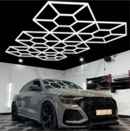 Car Detailing Studio Matrix LED LightPremium Matrix LED Car Detailing Studio Light Manufacturer, Supplier, Exporter, Dealer & Distributor in IndiaEnhance the quality of every detailing job with our Car Detailing Studio Matrix LED Light, engineered to deliver bright, shadow-free illumination for professional automotive detailing environments. Designed for car detailing studios, ceramic coating centers, PPF installation facilities, car washing stations, auto workshops, vehicle inspection bays, and automotive showrooms, this advanced LED lighting system ensures superior visibility for paint correction, polishing, wrapping, coating, and detailing applications.Manufactured using high-quality LED technology, the Matrix LED Light provides Cloud White illumination with excellent brightness and uniform light distribution. Its modular design allows flexible installation on walls and ceilings, creating a modern detailing studio that improves productivity while reducing energy consumption.Whether you are establishing a new detailing studio or upgrading an existing workspace, our Car Detailing Studio LED Lighting System offers a professional appearance, exceptional durability, and long-lasting performance.Key FeaturesHigh-performance 600W LED Matrix Lighting SystemBright Cloud White LED illuminationUniform shadow-free lighting for accurate vehicle inspectionIdeal for paint correction, ceramic coating, PPF installation, polishing, and detailingPremium ceiling-mounted modular lighting designEnergy-efficient LED technology with low power consumptionLong operational life with minimal maintenanceStrong aluminium frame for long-lasting durabilityEasy installation and modern workshop appearanceProvides professional lighting for automotive detailing businessesApplicationsOur Matrix LED Car Detailing Studio Lights are widely used in:Car Detailing StudiosCeramic Coating CentersPaint Protection Film (PPF) StudiosCar Washing CentersAuto Repair WorkshopsVehicle Inspection BaysAutomobile Service CentersLuxury Car ShowroomsCar Modification GaragesBike Detailing StudiosAutomotive Training InstitutesBenefits of Matrix LED Studio LightsProfessional detailing requires accurate lighting to identify paint imperfections, swirl marks, scratches, dents, holograms, coating defects, and polishing quality. Our Matrix LED Lighting System creates a bright and evenly illuminated workspace, allowing technicians to achieve superior detailing results with confidence.The advanced LED technology consumes less electricity than traditional lighting systems while producing consistent brightness throughout the studio. The modular hexagonal-inspired lighting layout enhances both workspace functionality and customer experience, making your detailing center look modern and premium.Why Choose Our Car Detailing Studio LED Lights?Leading Manufacturer of Car Detailing Studio LightsTrusted Supplier of Matrix LED Workshop LightsReliable Exporter of Automotive LED Lighting SystemsProfessional Dealer of Car Detailing EquipmentAuthorized Distributor of Garage Lighting SolutionsPremium Quality MaterialsEnergy Efficient LED TechnologyModern Workshop DesignFast Installation SupportLong Service LifePan India SupplyWorldwide Export AvailableFrequently Asked Questions (AEO Optimized)What is a Matrix LED Car Detailing Studio Light?A Matrix LED Car Detailing Studio Light is a professional automotive lighting system designed to provide bright, uniform illumination for car detailing, ceramic coating, polishing, PPF installation, and vehicle inspection.Why is LED lighting important for car detailing?Professional LED lighting helps technicians detect paint defects, scratches, swirl marks, coating imperfections, and polishing quality with greater accuracy.Where can Matrix LED Studio Lights be installed?These lights can be installed in car detailing studios, auto workshops, service centers, garages, ceramic coating facilities, PPF studios, and vehicle inspection bays.Is the lighting energy efficient?Yes. The system uses advanced LED technology that provides high brightness while reducing electricity consumption and maintenance costs.Do you supply Matrix LED Studio Lights across India?Yes. We supply and export Car Detailing Studio Matrix LED Lights throughout India and international markets.