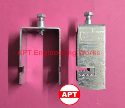 M/s APT Engineering Works are Solar Grip Clamp Manufacturers in Delhi NCR. The Solar Grip Clamps are a a heavy-duty mounting accessory designed to securely fasten solar module support structures, cable trays, and framing systems to rectangular GI/MS channels. Equipped with a robust G Clamp structure, these clamps can connect solar panels seamlessly. Manufactured from high-strength galvanized steel, it provides a firm, vibration-resistant grip through its serrated locking edges and bolt-tightening mechanism. The advanced features and sturdy construction enhance machine performance for reliable, long-lasting operations in solar energy projects.