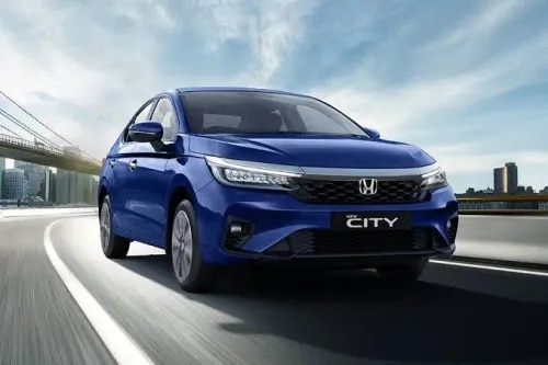 “The New Honda City – Sharper, Smarter Sedan at Deccan Honda Magarpatta”Discover the refined elegance and performance of the New Honda City at Deccan Honda Magarpatta – Authorized Honda Car Dealership in Pune. Now with a sharper, more contemporary design, the New City retains its elegant proportions while adding a more assertive character, making it the ideal midsize sedan for the modern Indian driver. Best Honda Car Showroom in Pune.With a tried-and-tested 1.5L i-VTEC petrol engine, the New City delivers a confident 121 PS of power and 145 Nm of torque, with a longer, wider LED headlamp throw for better visibility on the road. Choose between the smooth 6-speed manual or the refined 7-step CVT automatic to match your driving style.Step inside the New Honda City and experience premium interiors, spacious seating, and advanced features like a large touchscreen infotainment system, a 7-inch part-digital instrument cluster, sunroof, and an 8-speaker sound system. The sedan also features one of the largest boot capacities in its segment, perfect for travel and daily needs.Safety comes first with Honda SENSING ADAS, an optional 360-degree camera, dual airbags, ABS with EBD, and Honda's signature ACE™ body structure, ensuring complete peace of mind for you and your family.🔑 Key Features of The New Honda City at Deccan Honda Magarpatta:1.5L i-VTEC Petrol Engine – 121 PS / 145 Nm6-Speed Manual & 7-Step CVT AutomaticRefreshed LED Headlamps with New Honeycomb GrilleLarge Touchscreen Infotainment with Smartphone ConnectivityHonda SENSING ADAS & Optional 360-Degree CameraSunroof & 8-Speaker Sound SystemSegment-Leading Boot SpaceMileage up to 17.97 km/l✅ Why Buy The New Honda City from Deccan Honda Magarpatta?Best On-Road Price in PuneEasy Finance & Low EMI OptionsDoorstep Test Drive FacilityHonda Certified Sales & Service ExperienceExchange Bonus & Seasonal Offers AvailableVisit Deccan Honda Magarpatta Showroom today to book a test drive, get the latest on-road prices, and explore exciting offers on the New Honda City.📍 Deccan Honda Magarpatta – Your Trusted Honda Dealer in PuneHonda City PuneBuy Honda City in PuneHonda City showroom in PuneDeccan Honda Magarpatta City PuneNew Honda City price in PuneHonda City on-road price PuneHonda City mileageHonda City featuresBest sedan in PuneHonda City specificationsHonda City facelift PuneHonda City automatic PuneHonda City variantsHonda City CVT PuneBook Honda City test drive in PuneHonda City EMI options PuneAuthorized Honda City dealer in PuneHonda City service center in PuneHonda City petrol price PuneWhere to buy Honda City in PuneBest offers on Honda City Deccan Honda Magarpatta PuneHonda City comparison with Verna in PuneHonda City comparison with Slavia in PuneHonda City latest model 2026 PuneDeccan Honda Magarpatta Showroom PuneHonda Car Dealer near me in PuneDeccan Honda Magarpatta / Hadapsar / Kharadi / Wagholi / MundhwaHonda City Deccan Honda Magarpatta contact numberHonda City dealer in Magarpatta / Hadapsar / Kharadi / Fatima NagarHonda City Near MeHonda City IndiaHonda City MaharashtraHonda City PuneHonda City MagarpattaHonda City HadapsarHonda City KharadiHonda City Koregaon ParkHonda City WagholiHonda City DhanoriHonda City LohegaonHonda City VishrantwadiHonda City Tingre NagarHonda City KondhwaHonda City Fatima NagarHonda City KesnandHonda City PhursungiHonda City MundhwaHonda City Viman NagarHonda City AmanoraHonda City ManjariHonda City UndriHonda City NIBMHonda City WanowrieHonda City CampHonda City YerawadaHonda City SangamwadiHonda City Price in PuneHonda City On Road Price in MaharashtraHonda City Showroom Near MeHonda City Dealers in PuneHonda City Showroom in MagarpattaHonda City Price in HadapsarHonda City Dealer in KharadiHonda City Showroom in Viman NagarHonda City Car in KharadiHonda City Facelift in PuneHonda City Facelift Price in MaharashtraHonda City ZX+ in KharadiHonda City VX in MagarpattaHonda City Mileage in PuneBest Honda City Sedan Near MeHonda City On Road Price in PuneHonda City CVT Price in MaharashtraHonda City Automatic Price in HadapsarHonda City Top Model Price in MagarpattaHonda City EMI Offers in KharadiHonda City Exchange Offer in MagarpattaHonda City Test Drive in HadapsarHonda City Sunroof Variant in KharadiSpecificationsColours Crystal Black Pearl, Radiant Red Metallic, Obsidian Blue Pearl, Platinum White Pearl, Lunar Silver Metallic, Meteoroid Grey MetallicMileage 17.77 – 17.97 km/LTorque 145 Nm, @4300 rpmPower 121 PS, @6600 rpmEngine (cc) 1498 ccTransmission 6-Speed Manual & 7-Step CVT Automatic