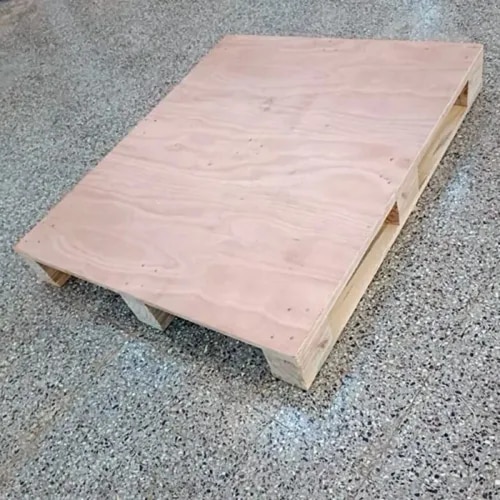Two Way Plywood Pallet is a strong, durable, and cost-effective packaging solution designed for safe handling, storage, and transportation of industrial and commercial goods. Manufactured using quality plywood, these pallets offer good load-bearing strength, dimensional stability, and resistance to regular handling conditions.The Two Way Plywood Pallet is designed for entry from two opposite sides by forklifts or pallet trucks, making it suitable for warehouses, manufacturing units, logistics operations, export packaging, and material-handling applications. Its sturdy construction helps protect products during transportation while providing a stable base for stacking and storage.Key FeaturesMade from high-quality plywoodStrong and durable constructionGood load-bearing capacityTwo-way forklift entry designLightweight compared with many conventional wooden palletsSuitable for stacking and warehouse storageEasy to handle and transportAvailable in customized sizes and specificationsApplicationsTwo Way Plywood Pallets are widely used for industrial packaging, export packaging, warehousing, logistics, material handling, machinery packaging, automotive components, engineering products, and general cargo transportation.Why Choose Two Way Plywood Pallets?These pallets provide a practical combination of strength, durability, stability, and economical packaging. Their plywood construction makes them suitable for businesses looking for reliable pallets for repeated handling and transportation requirements.