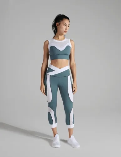 Women’s Yoga Wear SetSet: Yoga Top + Yoga LeggingsFabric: Nylon / Polyester + SpandexGSM: 220–280 GSMFit: Slim / Body-ConformingStretch: 4-Way StretchFeatures: Moisture-wicking, breathable & quick-dryWaistband: High-rise elastic waistbandUse: Yoga, Pilates, Gym, Training & Everyday Activewear