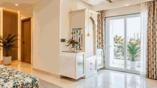 Elegant Bedroom Pooja Unit with Arched White Cabinet and Balcony Views | Velachery product image