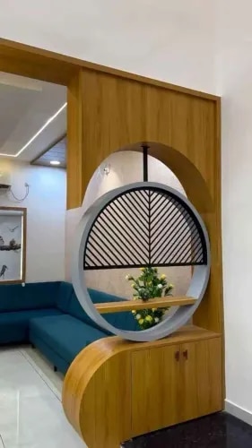 Circular Wooden Partition Design with Decorative Geometric Screen and Curved Storage Cabinet | Porur product image