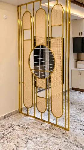 Gold Metal Partition with Cane Panels and Circular Mirror Design | Adyar product image
